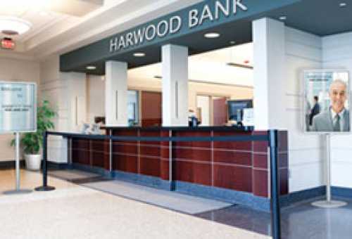 Poster sign holder stand displayed at bank